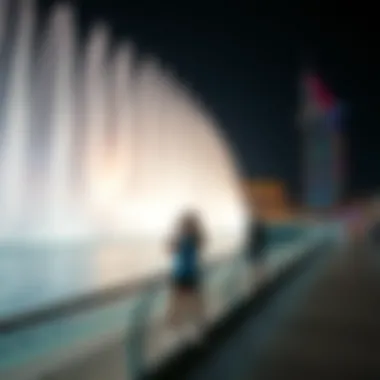 Visitors enjoying the Dubai Fountain performance from the Boardwalk