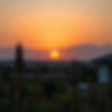 Sunset View Over a Farmhouse Sunset view over a farmhouse with mountains in the background